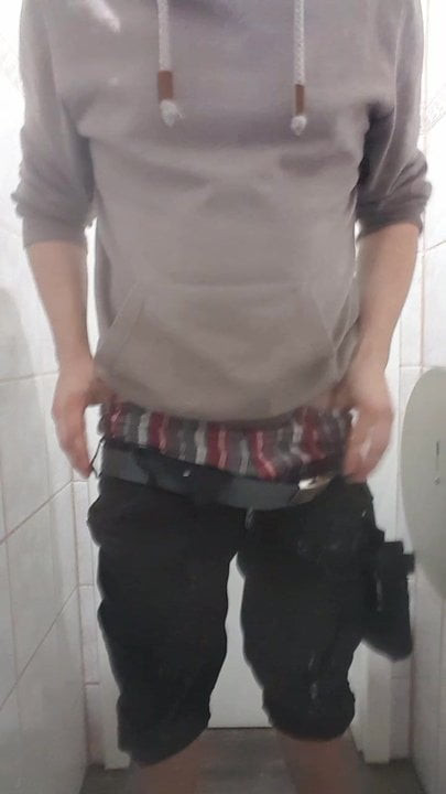 pissing in public bathroom