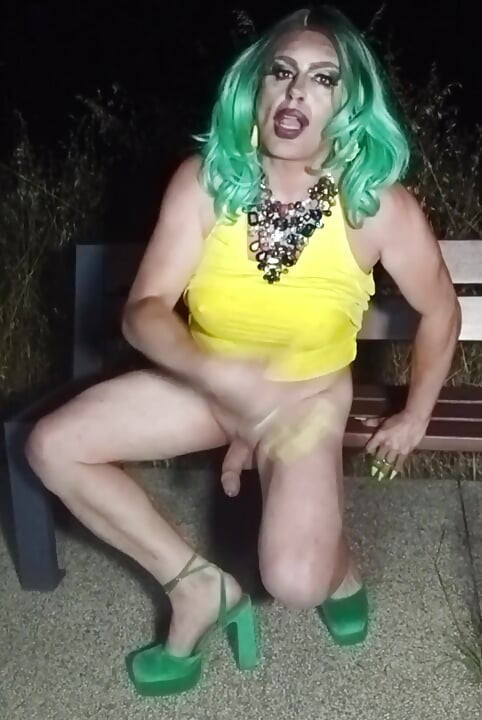 Sexy mature transvestite slut party summer showing off in a public park