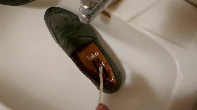 Piss in men's dress shoe