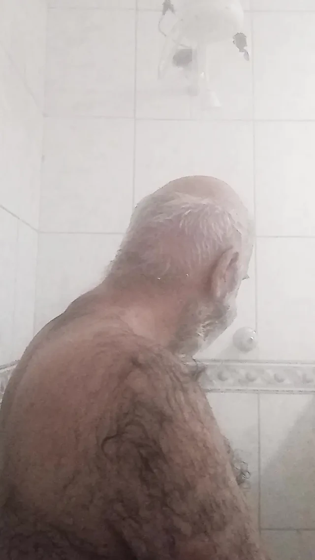 HAIRY BRUTE TAKING A SHOWER