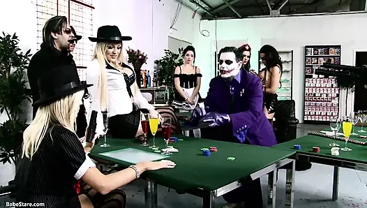 A group get together in costume and turn each other on