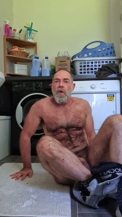 Hairy Bear Doing Laundry