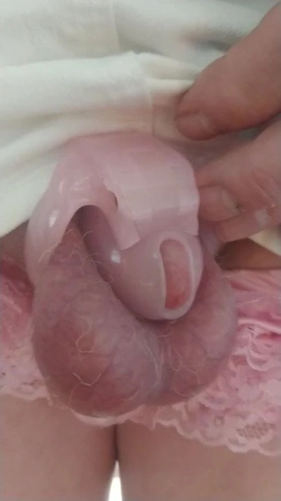 Tiny pink nub  chastity cage