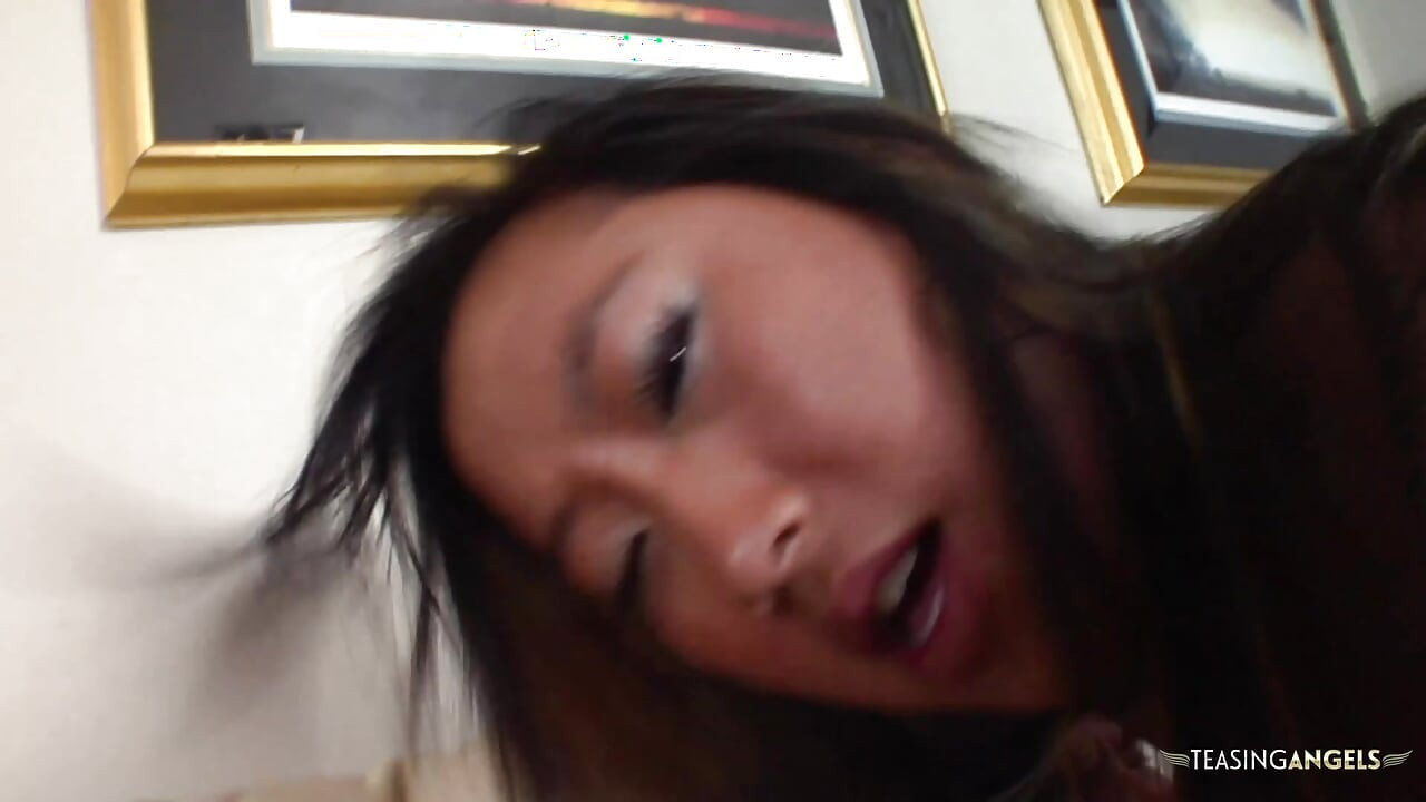 Exuding self-assurance, this Asian woman adorned her attractive face with a substantial amount of genitalia