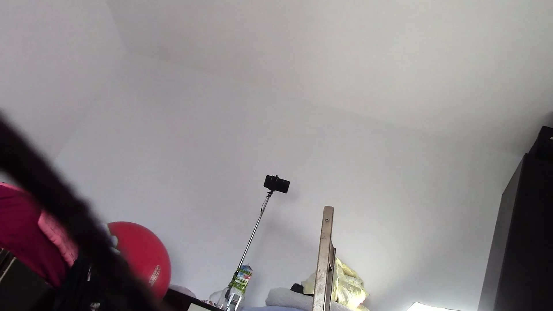 Amateur wife dancing naked at home. Amateur woman has fun trying on clothes and cutting them.
