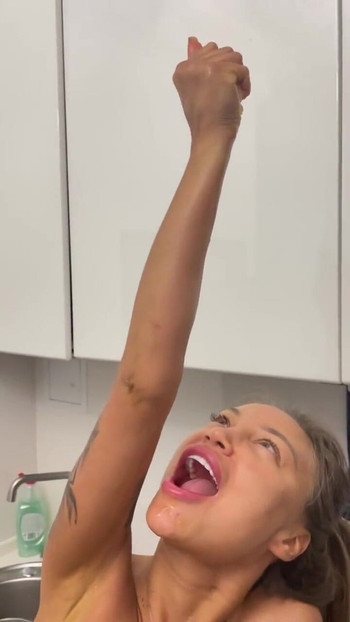 Jaw-dropping moment from "Naked Monika Fox Makes Orange Juice & Squeezes Juice On Herself"
