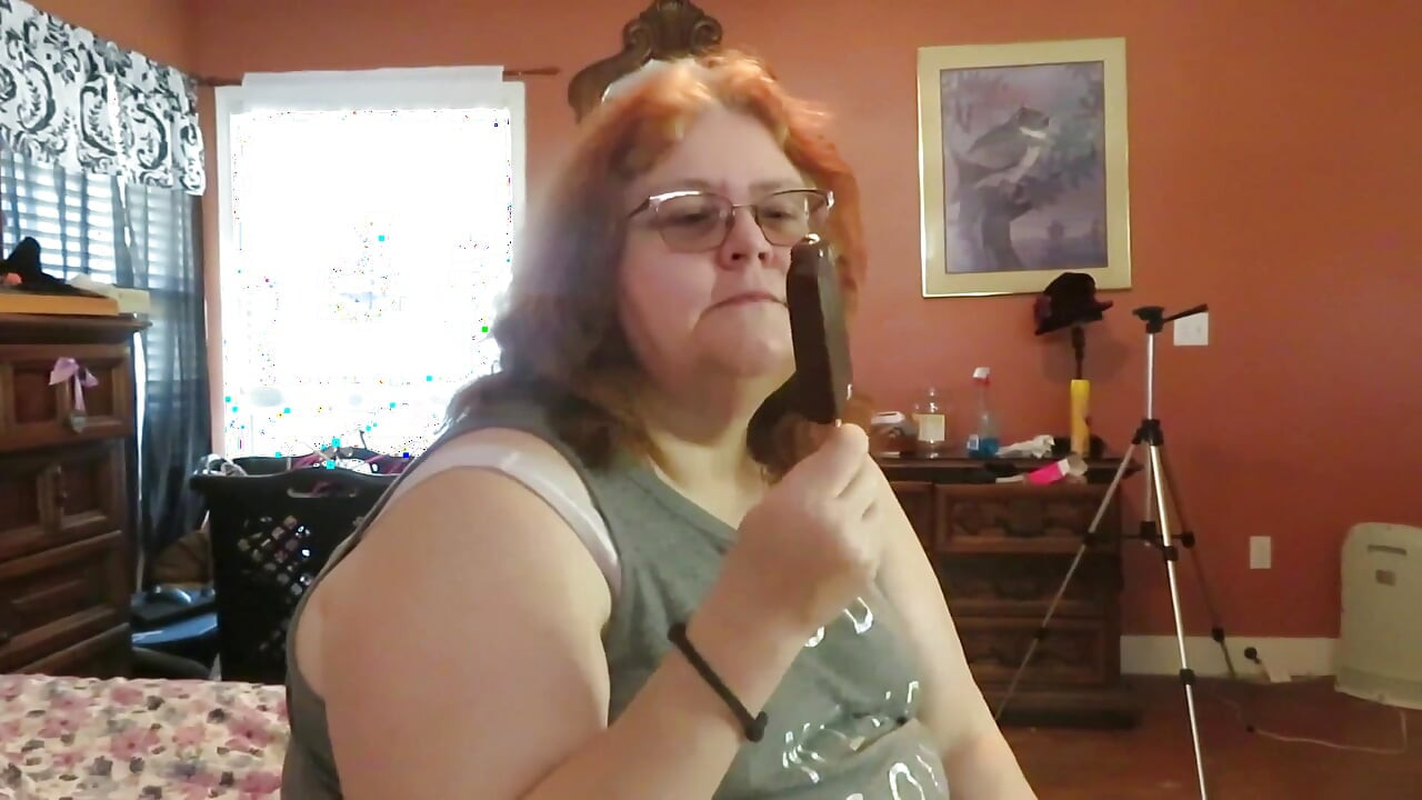BBW nurse Vicki enjoys eatting a chocolate vanilla ice cream popsiscle