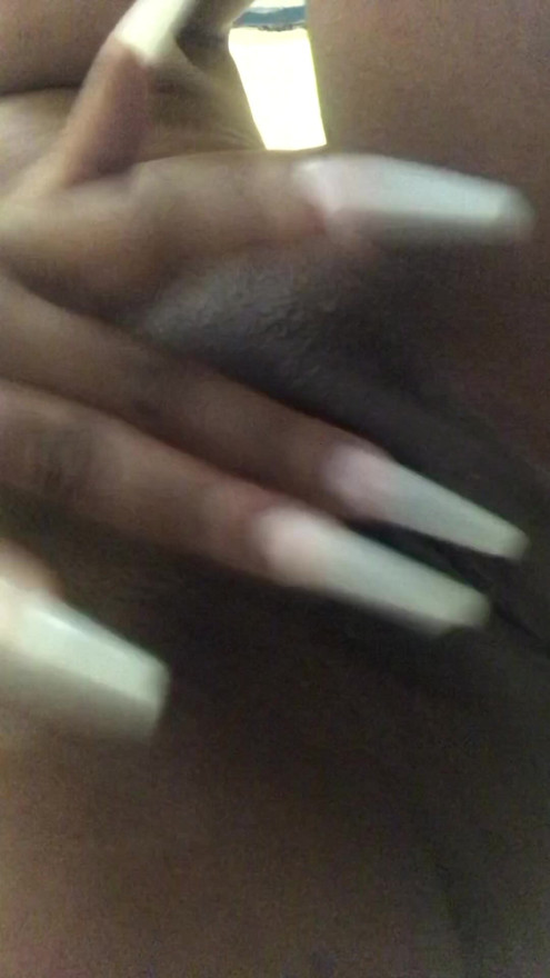 Masturbating