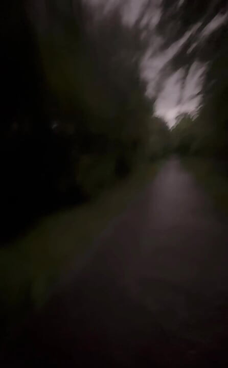 Long naked barefoot walk from car to a welcome to my town sign