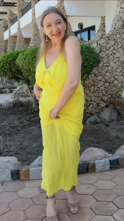 Fan in yellow dress