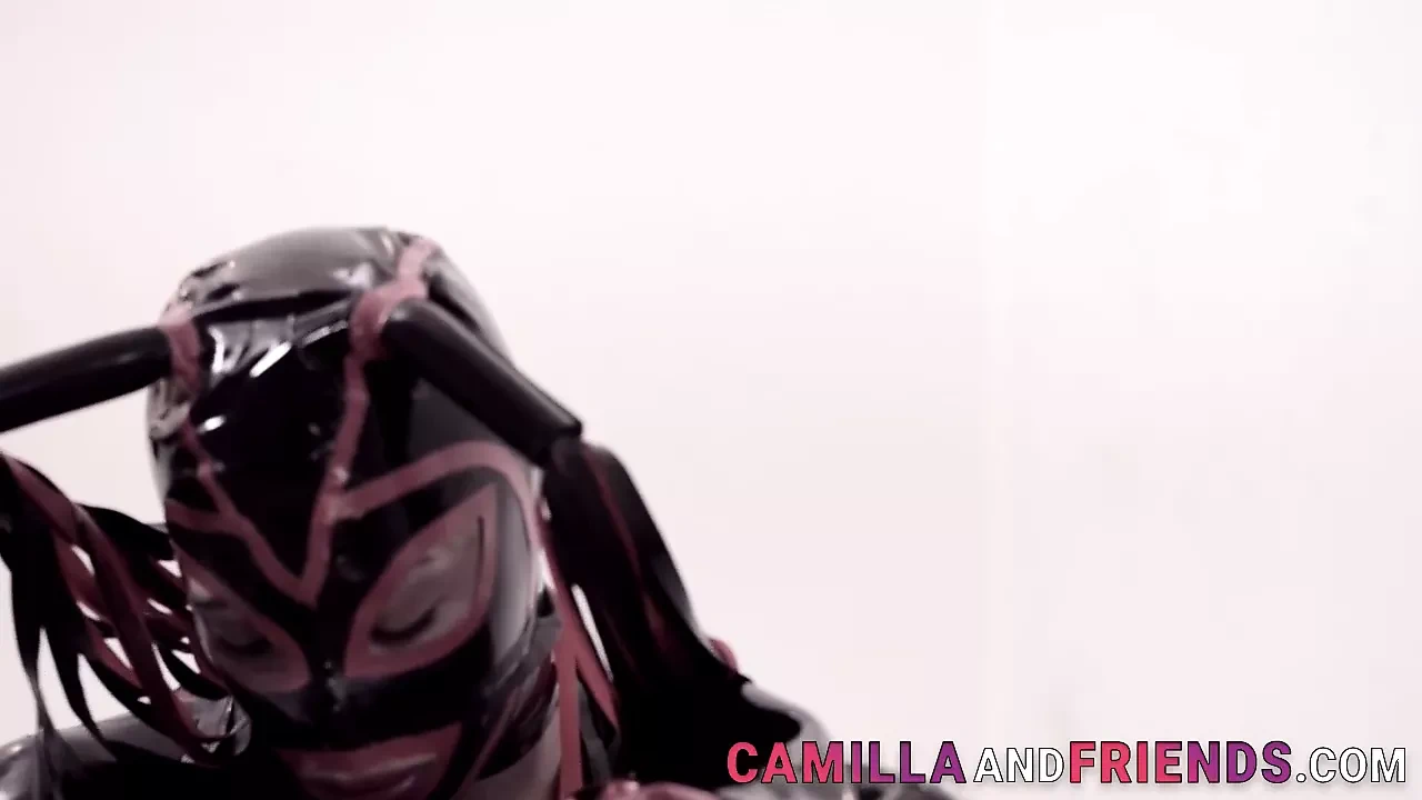 Fetish shemale in latex suit and mask fucks