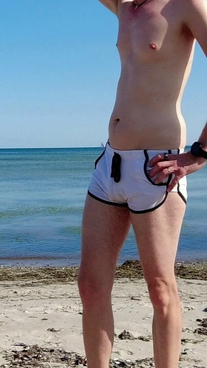Piss in my swim shorts at the public beach