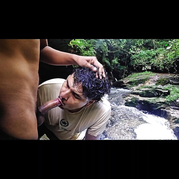 Indian man fucking young gay man in a waterfall