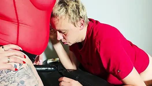 Femdom. He Smokes a Cigarette and a Busty Woman Fucks Him Hard in the Ass with a Strapon.