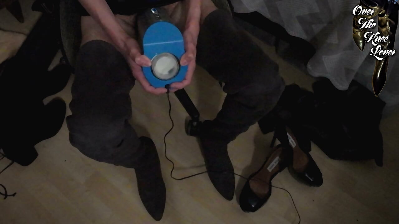 crossdresser autoblows in a leather dress and suede thigh high boots
