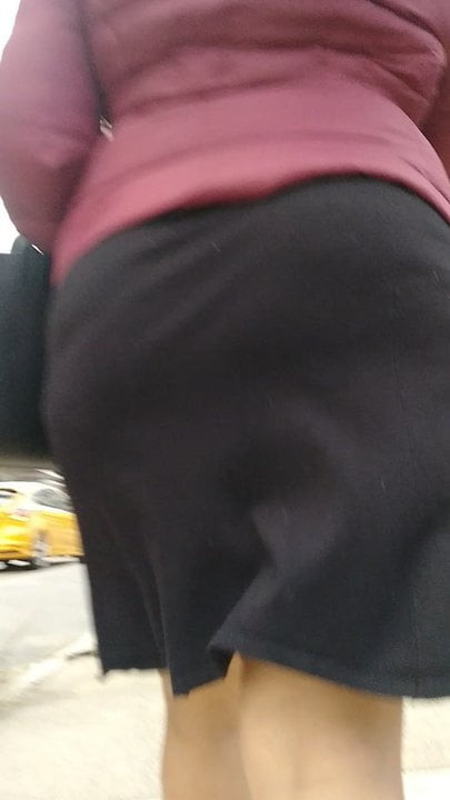 Latina ass shaking in dress