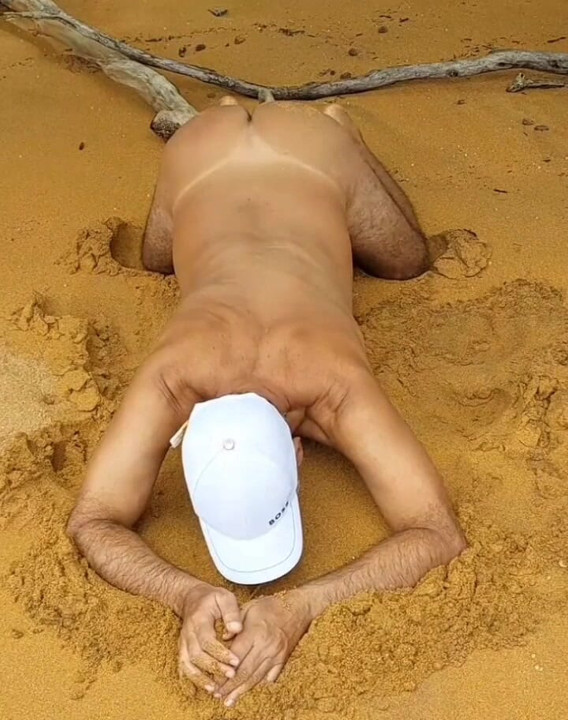 Ladysilva on all fours on the beach what a hot ass