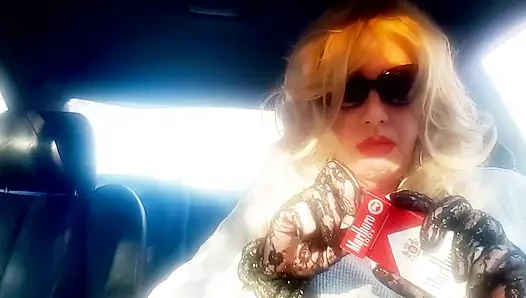 MRS. ROMAN SMOKING MARLBORO 100's IN HER CAR