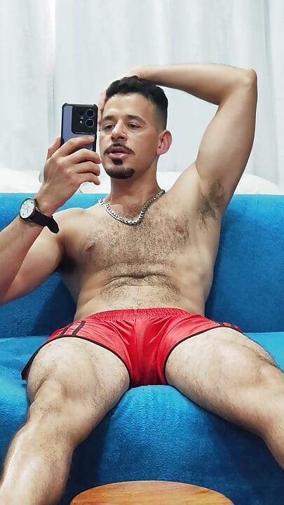 Teasing with red football shorts