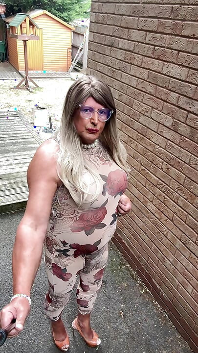 Sexy Crossdresser kellycd2022 in sexy floral see thru catsuit and heels
