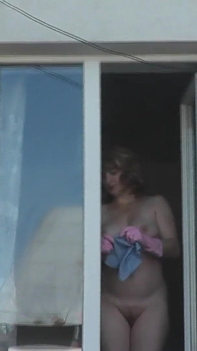 Must-see moment from "Neighbor taxi driver from looks at neighbor MILF who washes window of apartment naked. Nude in public"
