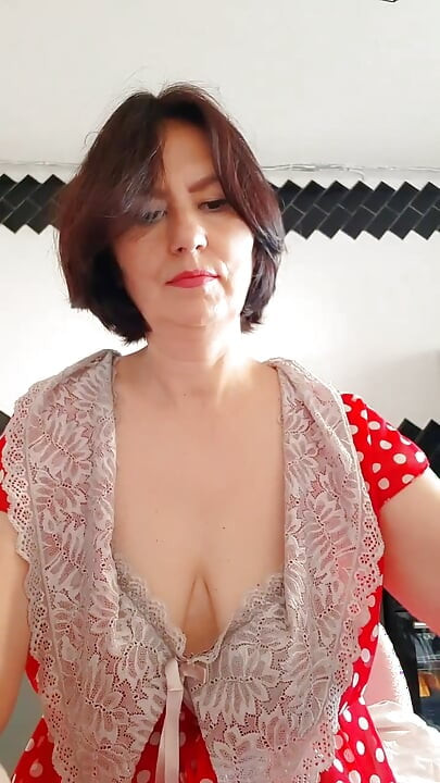 She knitted herself red lace lingerie and tried it on