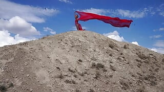 On Top of Hill with Red Flag