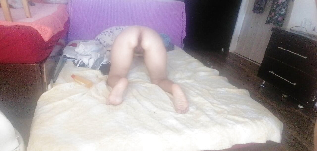 Sensual massage of a hot couple with oil on the body.