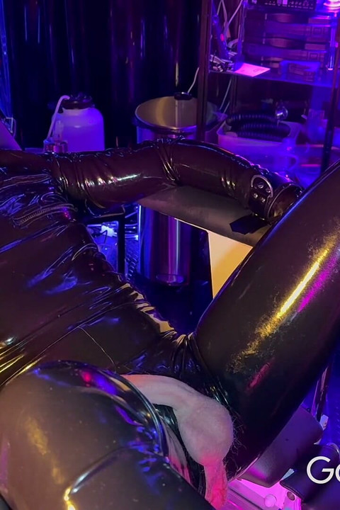 Rubber Gimp Pegged in Chastity