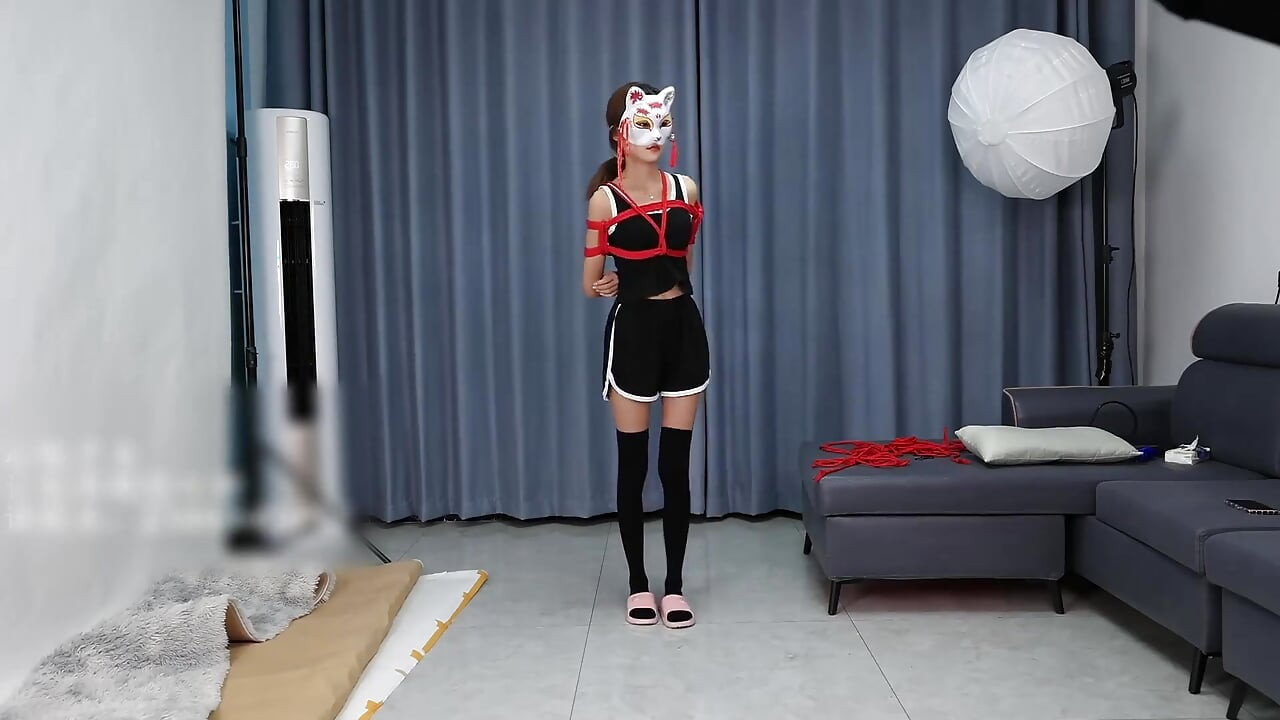 A Young, Beautiful, Slender, and Adorable Girlfriend, with Black Stockings, Red Strings, and Restraints