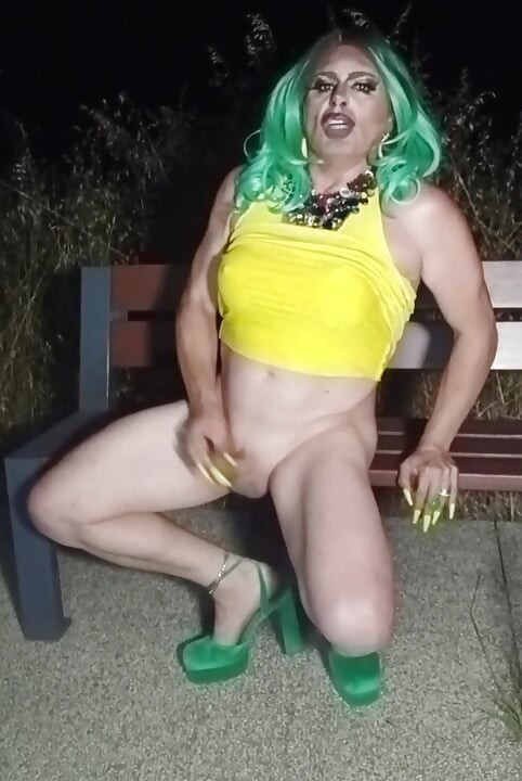 Sexy mature transvestite slut party summer showing off in a public park