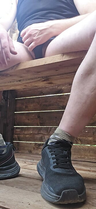 On the high seat in the forest in the underwear of the EX