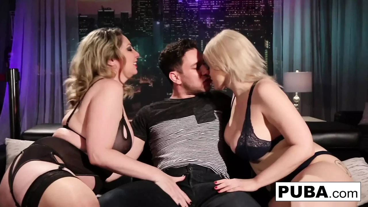 Hot club goers double team a big dick stud!