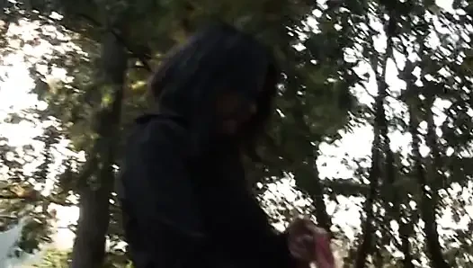 Hot and sexy milf fingers her pussy on the bench of a park