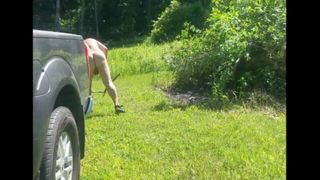 Old man works in yard