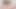 赤毛の痩せた女の子が自慰行為、レザーブラと赤いTバックを履いている