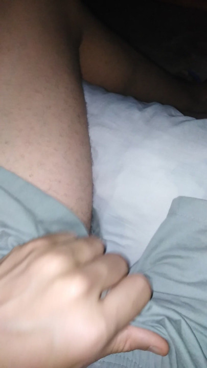 Masturbating