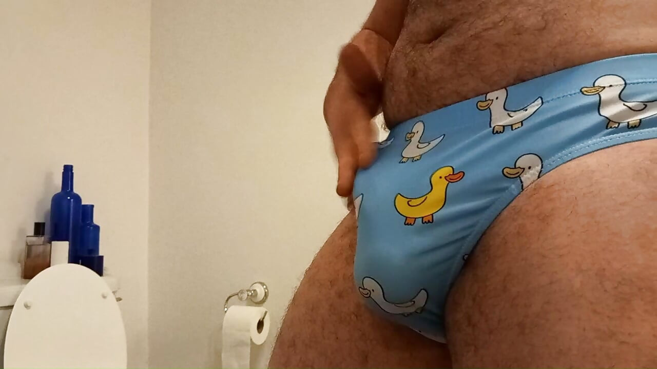 Speedo cum. Rubbing, vibrating, masturbating small penis bulge in speedo, swim trunks, brief. Please humiliate in the comments.