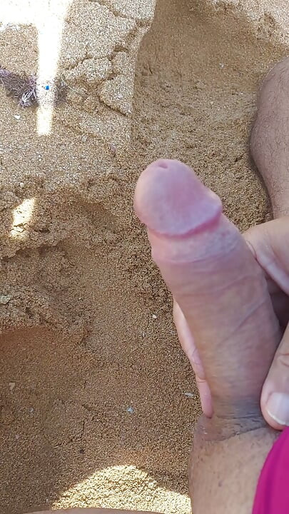 Ladysilva masturbating his cock on a deserted beach until he cums hot