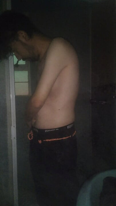 Man Showering with Flashlight On