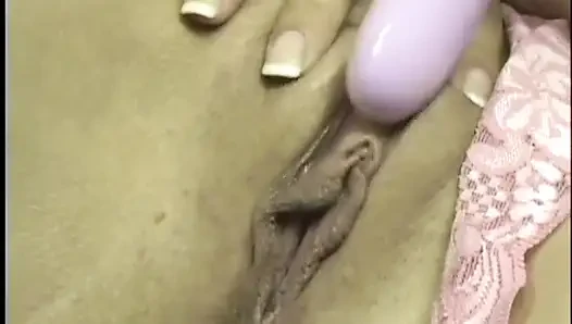 Trampy young brunette Nevaeh Ashton holds vibrator to her clit then shoves it in her shaved cunt
