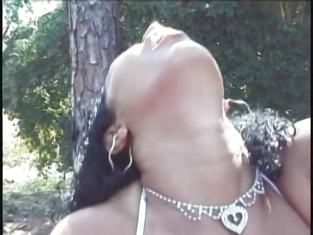 Babes by the trees lick twat and use dildo to fuck pussy after rim job
