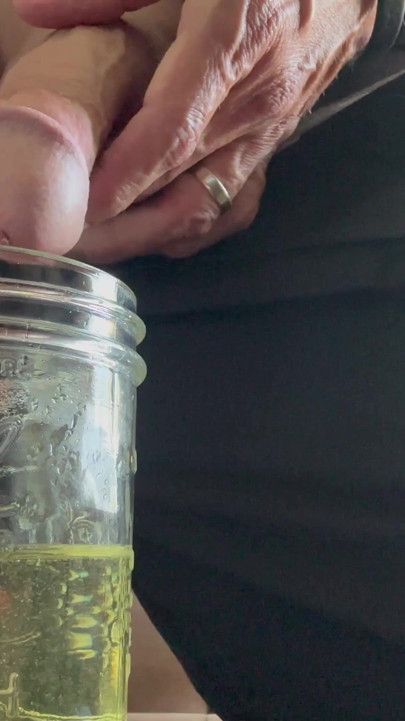 Erotic pissing in jar and masturbation | Clip 1