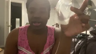 Busty black woman shows how she squeezes milk from her tits
