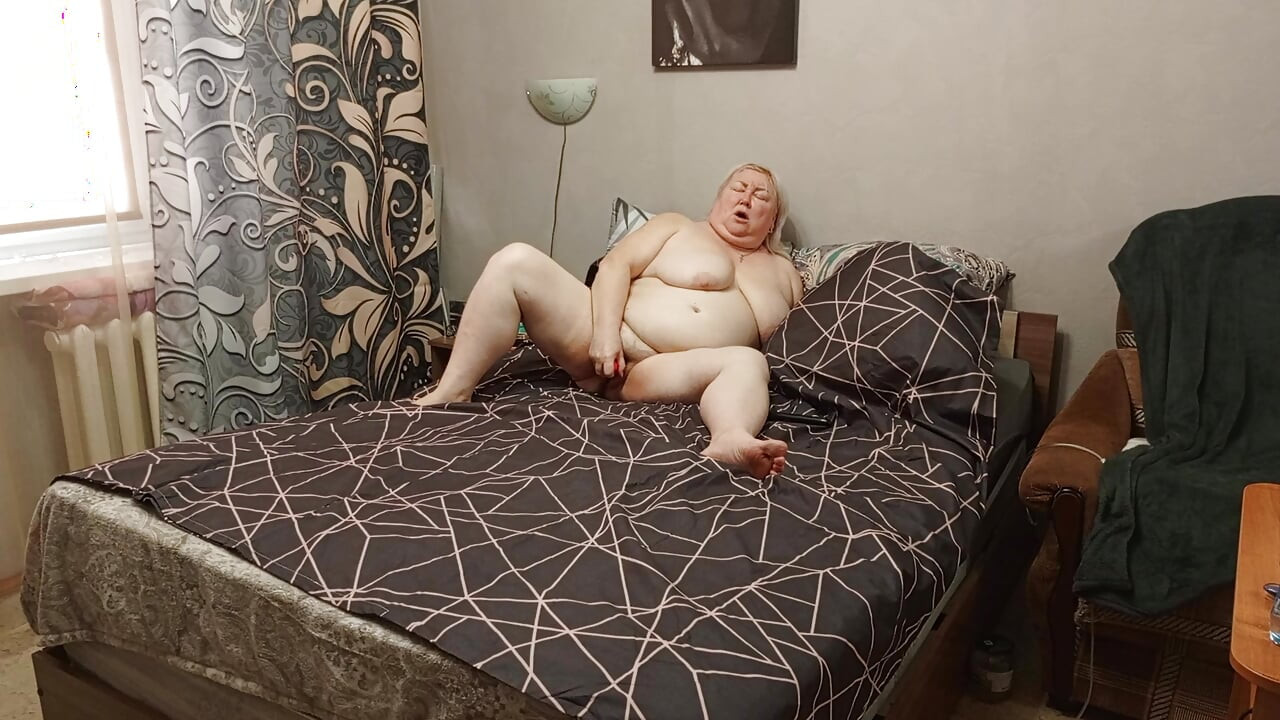 Naked stepmom masturbates big pussy with a sex toy