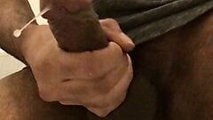 Hairy bear strokes his fat cock and cums – slow-mo