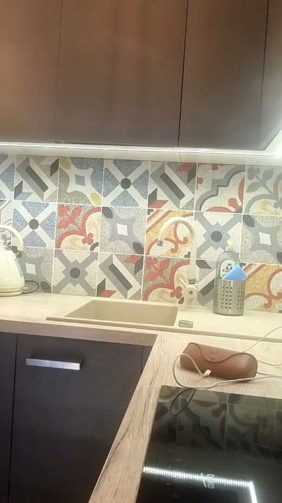 Hot petite real college girl in a plaid school uniform mini skirt flashes her legs and cotton panties in the kitchen | Clip 1