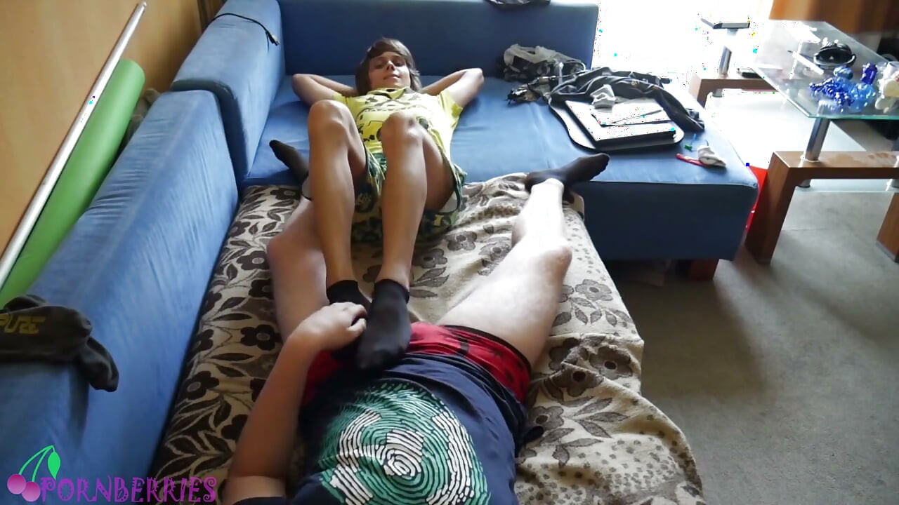 Thin, black socks blowing up balloons + footjob
