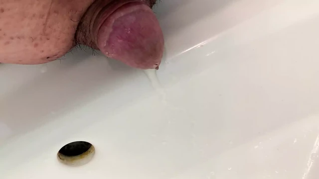 Small penis takes a pee