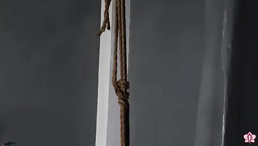 Hanging by Her Ankles From Rope Bondage, Slave Mila Can't Escape the Wand Attached to Her Swollen Pussy